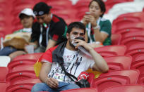 <p>A Germany fan sits dejected in the stands after his team lose the group F match between South Korea and Germany, at the 2018 soccer World Cup in the Kazan Arena in Kazan, Russia, Wednesday, June 27, 2018. South Korea won the match 2-0. (AP Photo/Frank Augstein) </p>