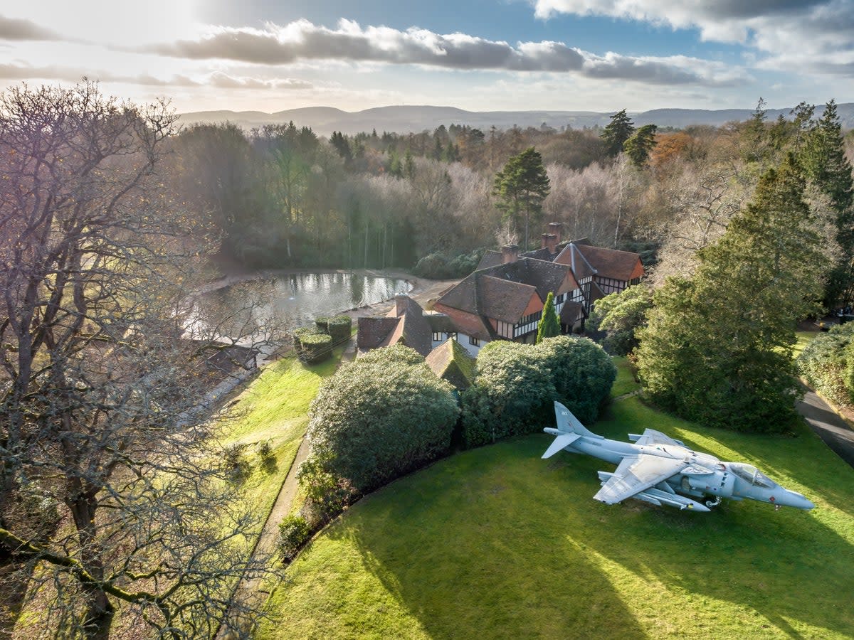 A decommissioned attack-bomber jet is an unusual addition to this property listing (Savills)