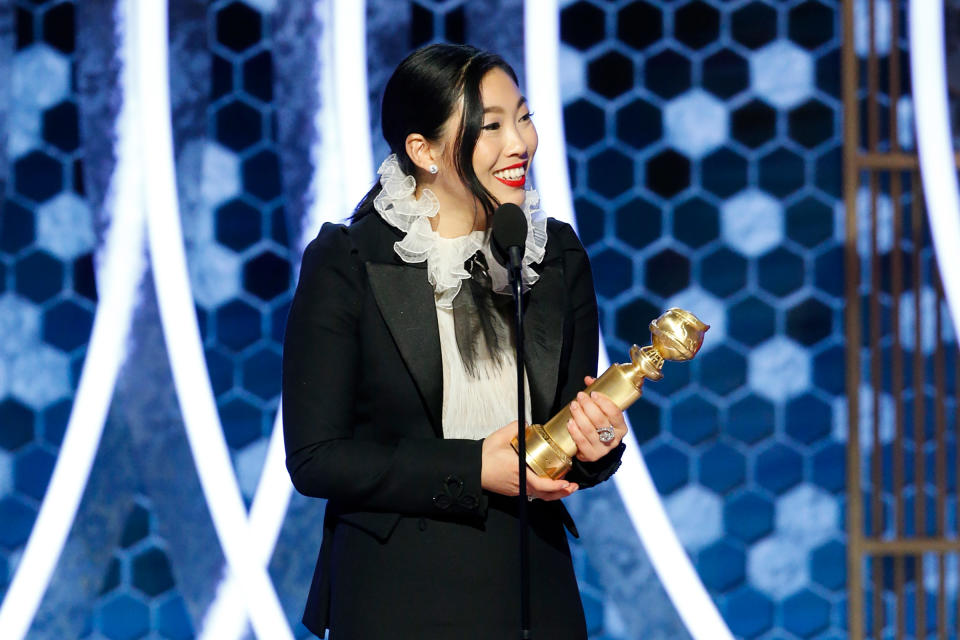 Awkwafina accepts the award for best performance by an actress in a motion picture - musical or comedy for 