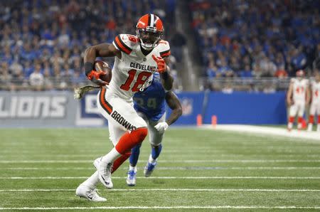 Nov 12, 2017; Detroit, MI, USA; Kenny Britt (18) runs after a catch for a touchdown during the first quarter against Detroit Lions cornerback Nevin Lawson (24) at Ford Field. Raj Mehta-USA TODAY Sports