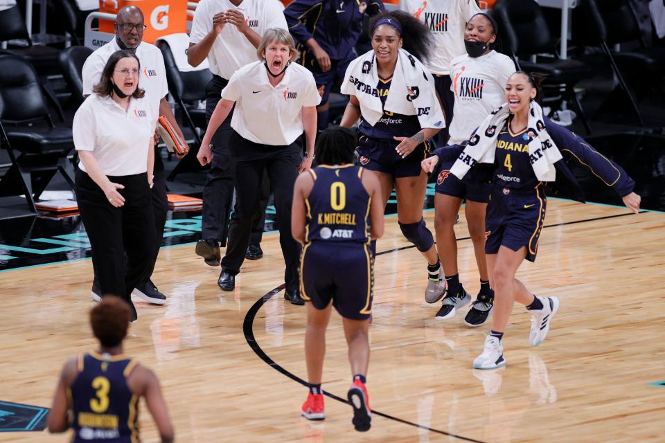 The Indiana Fever react after a basket made by Kelsey Mitchell #0 during the second half against the New York Liberty at Barclays Center on May 14, 2021 in the Brooklyn borough of New York City.