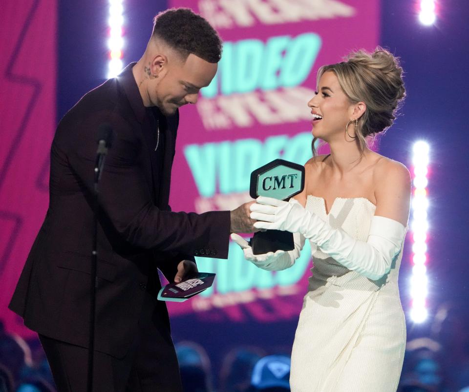 Kane Brown and his wife Katelyn Jae appear on stage at the CMT Music Awards as he accepts the award for Video of the Year at the Moody Center on Sunday April 2, 2023.