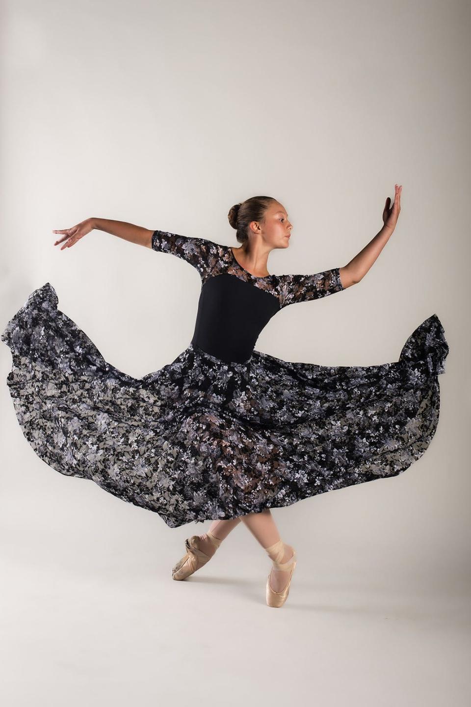 GO! Contemporary Danceworks’ Mary Virginia Bohner executes a graceful turn in the company’s 20th anniversary celebration entitled “reGENERATION” at the Tennessee Amphitheater on Sept. 29.
