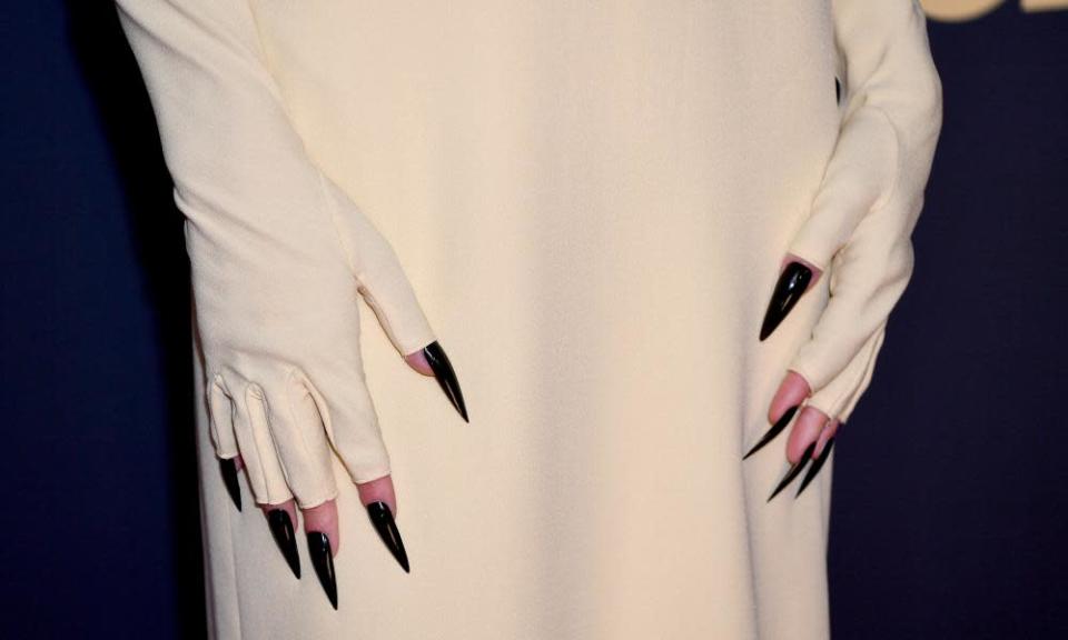 Emma Corrin&#x002019;s killer manicure: very long, black, pointy nails