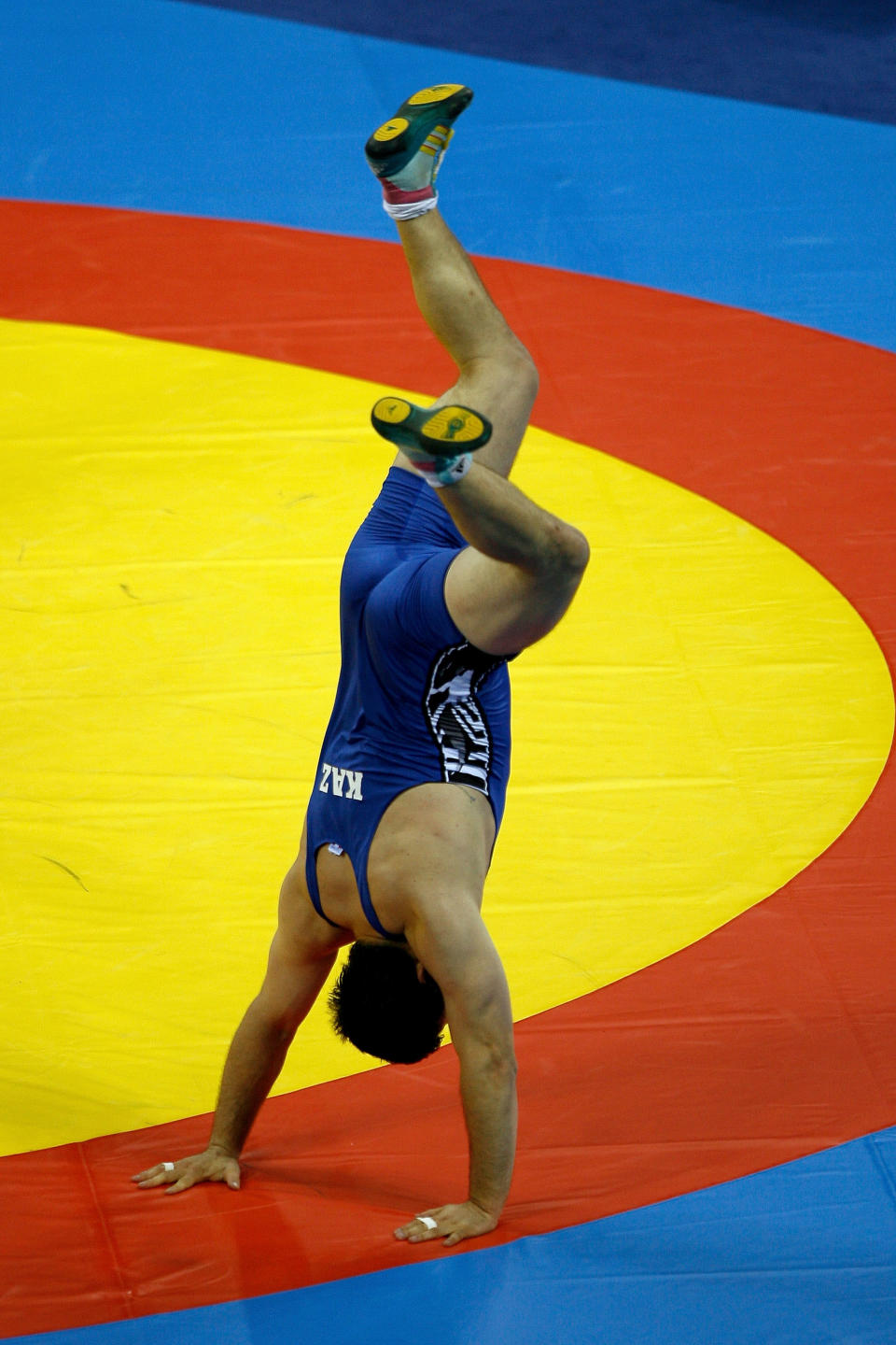 BEIJING - AUGUST 21: Marid Mutalimov of Kazakstan celebrates after winning the bronze medal in the men's 120 kg wrestling gold medal match held at the China Agricultural University Gymnasium during Day 13 of the Beijing 2008 Olympic Games on August 21, 2008 in Beijing, China. (Photo by Harry How/Getty Images)