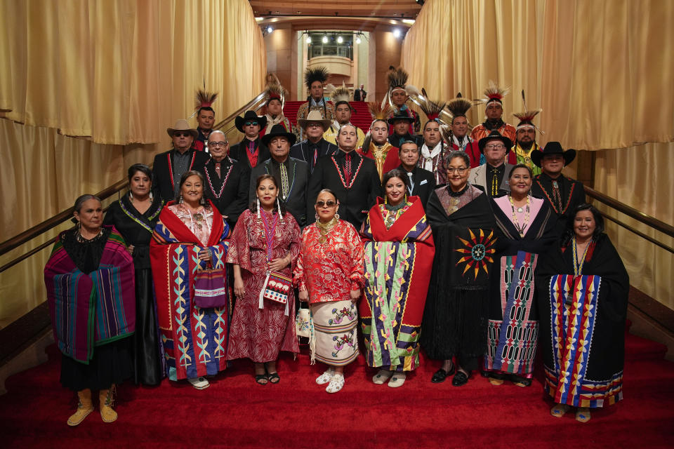 Members of the Osage Nation arrive at the Oscars on Sunday, March 10, 2024, at the Dolby Theatre in Los Angeles. (AP Photo/John Locher)