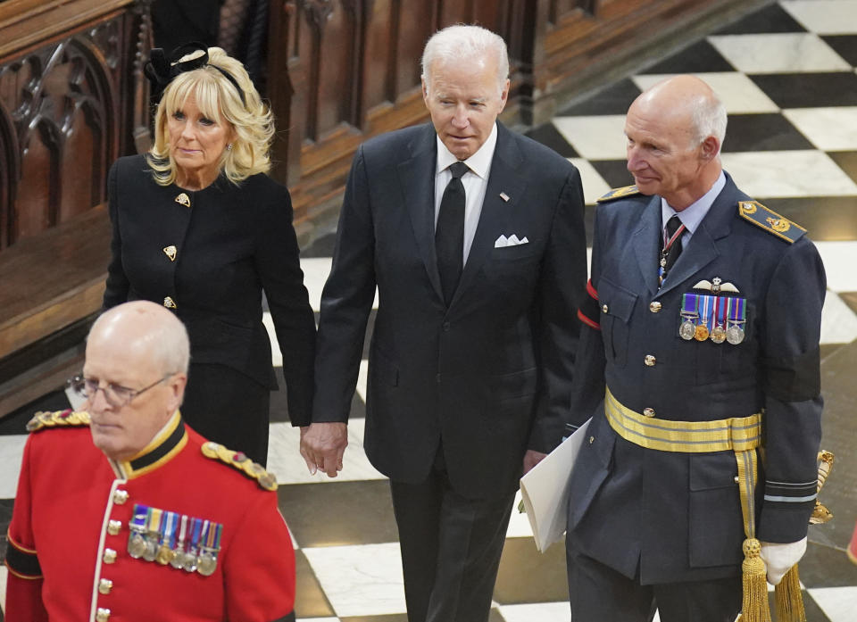 FILE - U.S. President Joe Biden, center, and first lady Jill Biden arrive for the funeral service of Queen Elizabeth II at Westminster Abbey in central London, Sept. 19, 2022. (Dominic Lipinski/Pool Photo via AP)