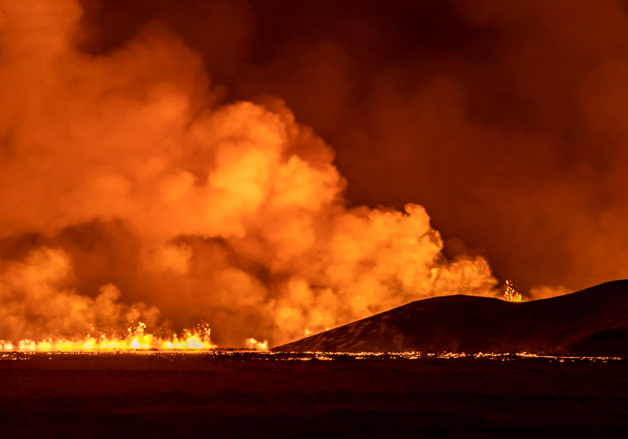 A volcano spews lava and smoke as it erupts in Grindavik, Iceland, December 18, 2023. (Photo by Snorri Thor/NurPhoto via Getty Images)