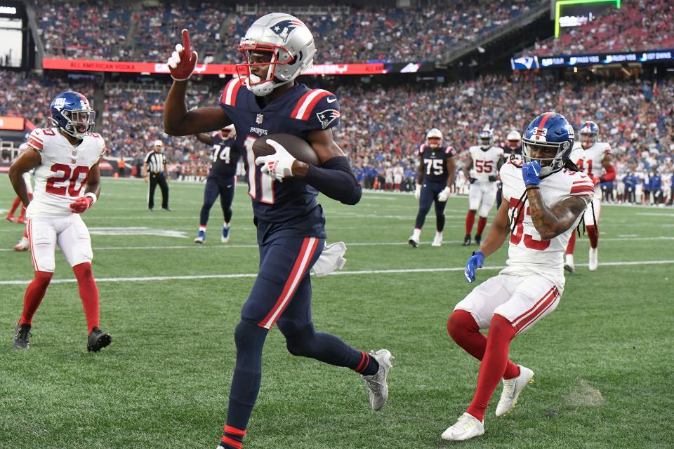 Aug 11, 2022; Foxborough, Massachusetts, USA; New England Patriots wide receiver Tyquan Thornton (11) catches a touchdown against the New York Giants during the first half of a preseason game at Gillette Stadium. Mandatory Credit: Eric Canha-USA TODAY Sports