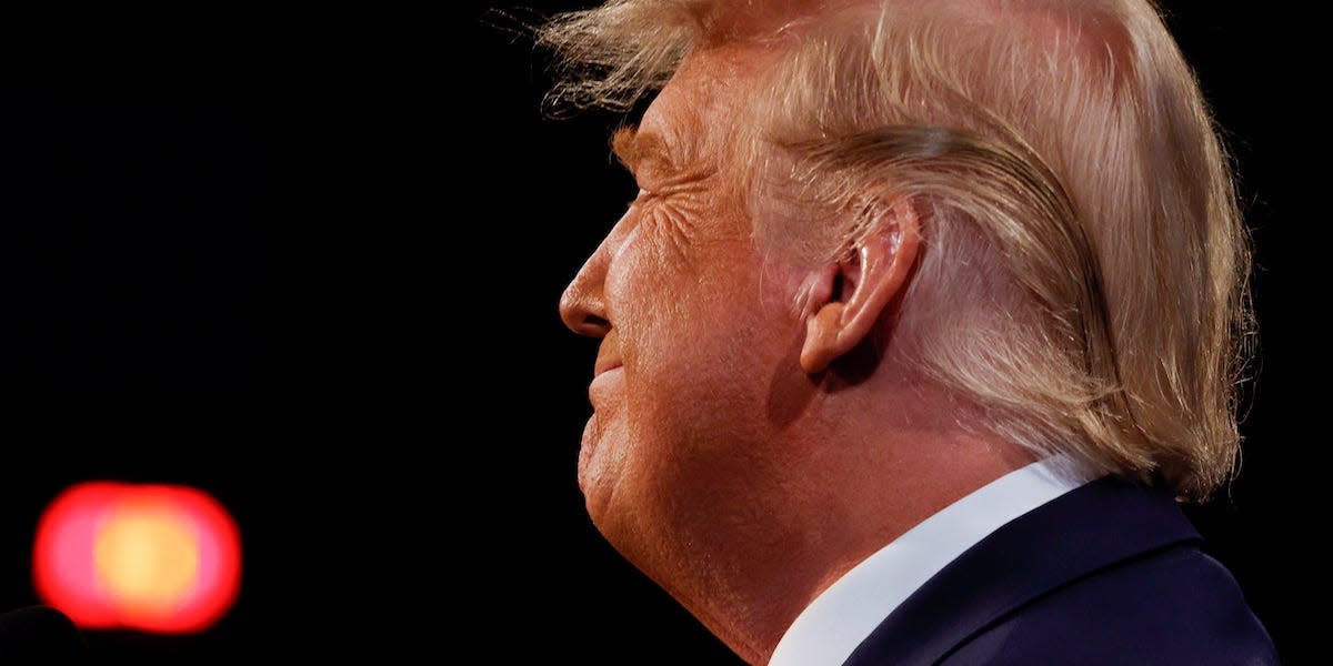 U.S. President Donald Trump reacts during the third and final presidential debate with Democratic presidential nominee Joe Biden at Belmont University in Nashville, Tennessee, U.S., October 22, 2020. REUTERS/Jim Bourg/Pool