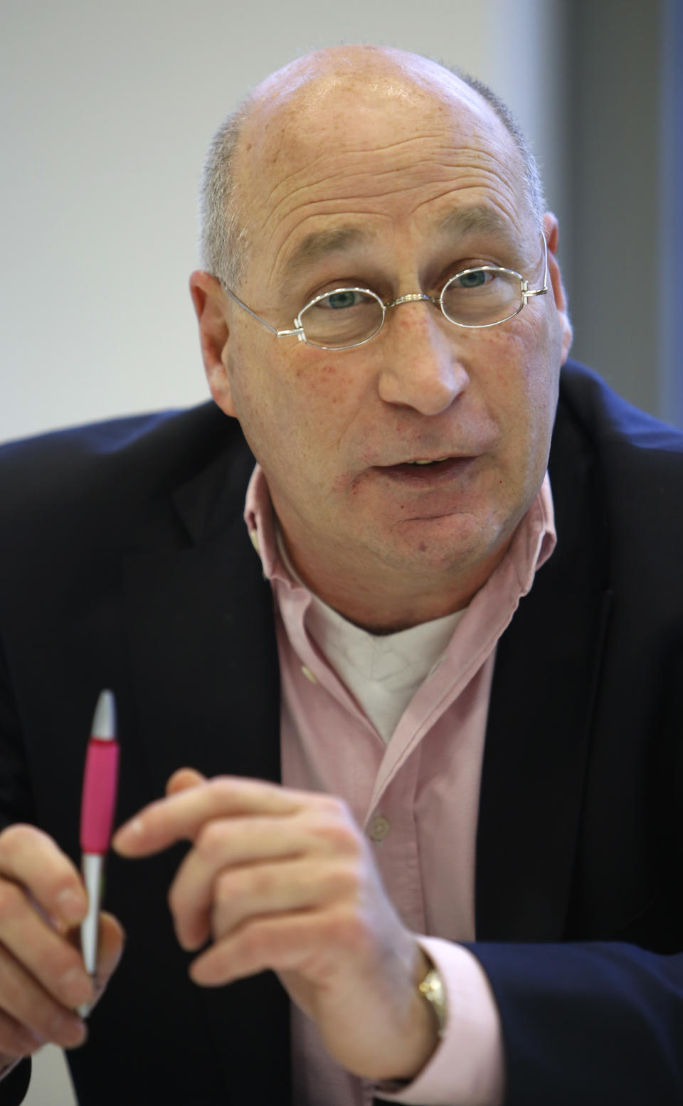 In this Dec. 16, 2013 photo, Tuvia Schlesinger gives a news conference in Berlin. Schlesinger, 61, a retired police official who comes from a Berlin family that left for Israel after the Holocaust and returned here in 1959, is helping lead a call for new elections for the leadership of the Jewish Community of Berlin. If that fails, many say they will break away and found their own group. "It hurts to give it all up and let it all go to the dogs," Schlesinger says. "My parents helped rebuild this community after the war. I’d hate to see it break apart completely." (AP Photo/Ferdinand Ostrop)