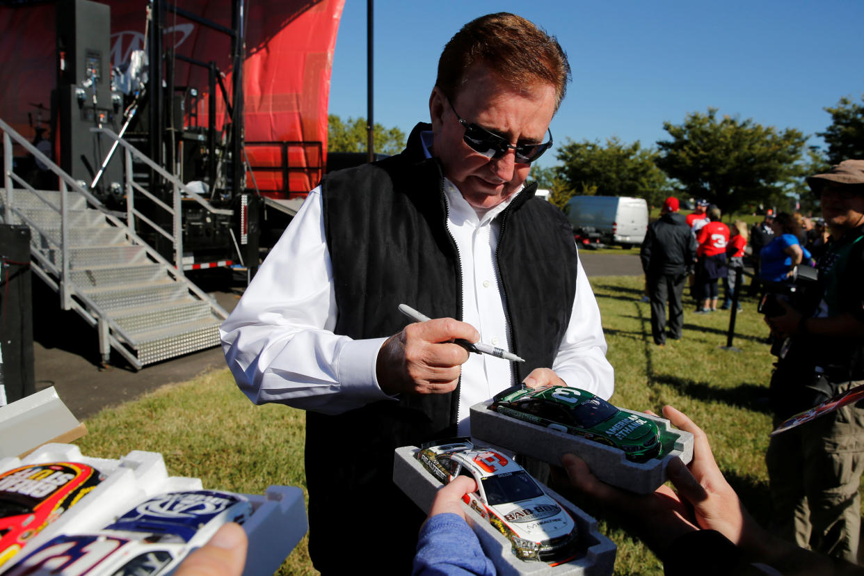 Race team owner Richard Childress signs autographs for fans before the Monster Energy NASCAR Cup Series Apache Warrior 400 race at Dover International Speedway in Dover, Delaware, U.S. October 1, 2017. REUTERS/Jonathan Ernst