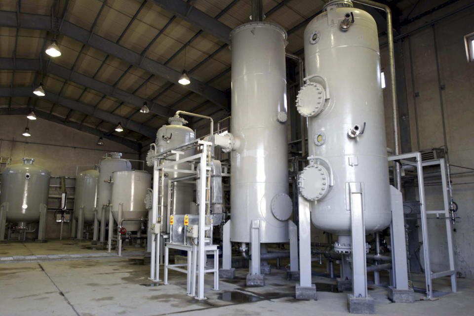 FILE -- This Oct. 27, 2004 file photo, shows the interior of the Arak heavy water production facility in Arak, 223 miles (360 kilometers) southwest of Tehran, Iran. When it comes to saving Iran's nuclear deal, Europe finds itself in the impossible situation of trying to salvage an accord unraveling because of the maximalist U.S. sanctions campaign. (AP Photo/Fars News Agancy, File)