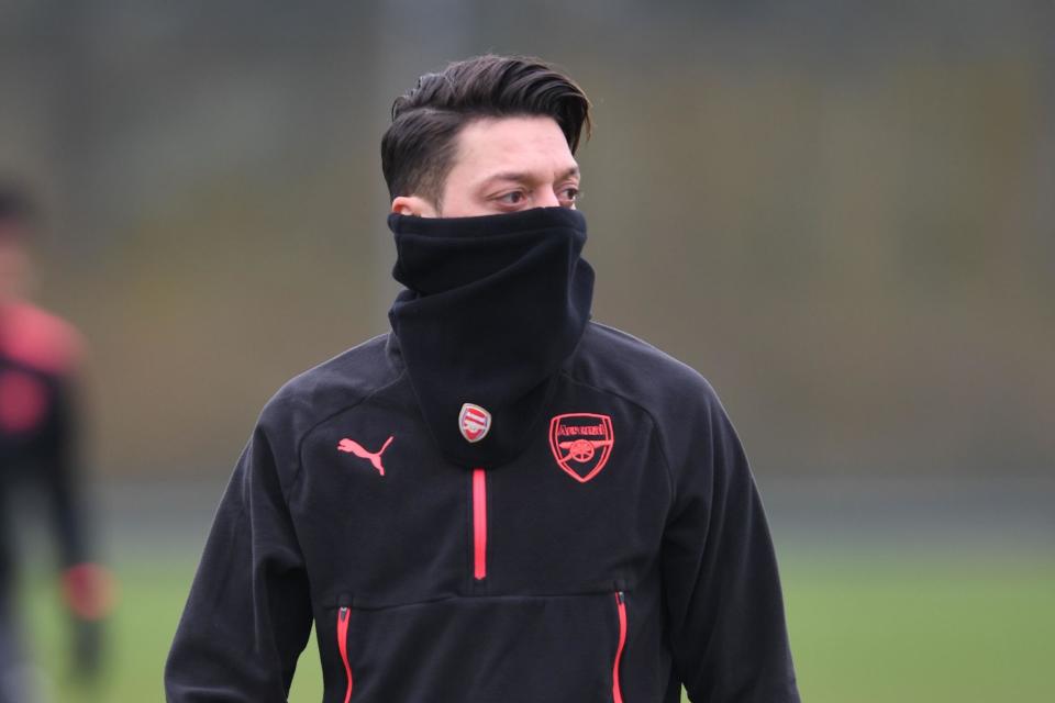 Arsene Wenger concerned by Mesut Ozil's illness record with Arsenal star out of Europa League tie