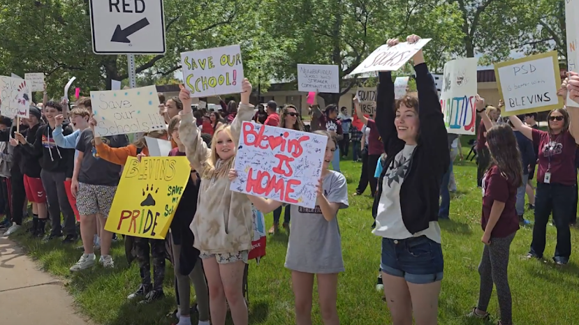 Middle school student protesters with signs