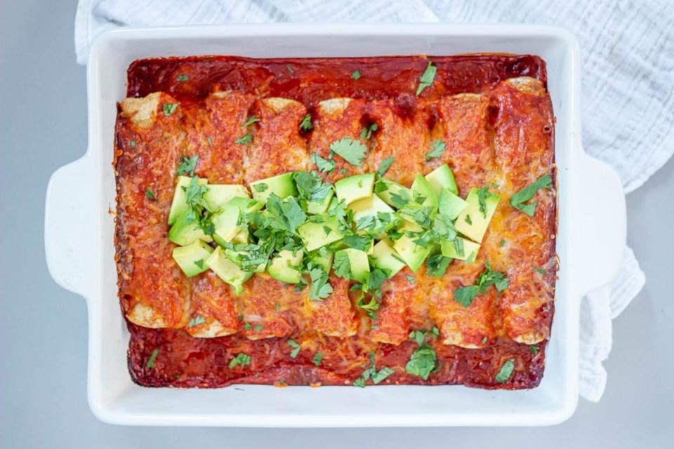 <p>If enchiladas are one of <a href="https://www.thedailymeal.com/cook/best-mexican-recipes?referrer=yahoo&category=beauty_food&include_utm=1&utm_medium=referral&utm_source=yahoo&utm_campaign=feed" rel="nofollow noopener" target="_blank" data-ylk="slk:your favorite Mexican dishes;elm:context_link;itc:0;sec:content-canvas" class="link ">your favorite Mexican dishes</a>, then this is the recipe for you. Have your kids line the pan with the ingredients while you preheat the oven and cook the chicken.</p> <p><a href="https://www.thedailymeal.com/recipes/three-ingredient-chicken-enchiladas?referrer=yahoo&category=beauty_food&include_utm=1&utm_medium=referral&utm_source=yahoo&utm_campaign=feed" rel="nofollow noopener" target="_blank" data-ylk="slk:For the Easy Chicken Enchiladas recipe, click here.;elm:context_link;itc:0;sec:content-canvas" class="link ">For the Easy Chicken Enchiladas recipe, click here.</a></p>