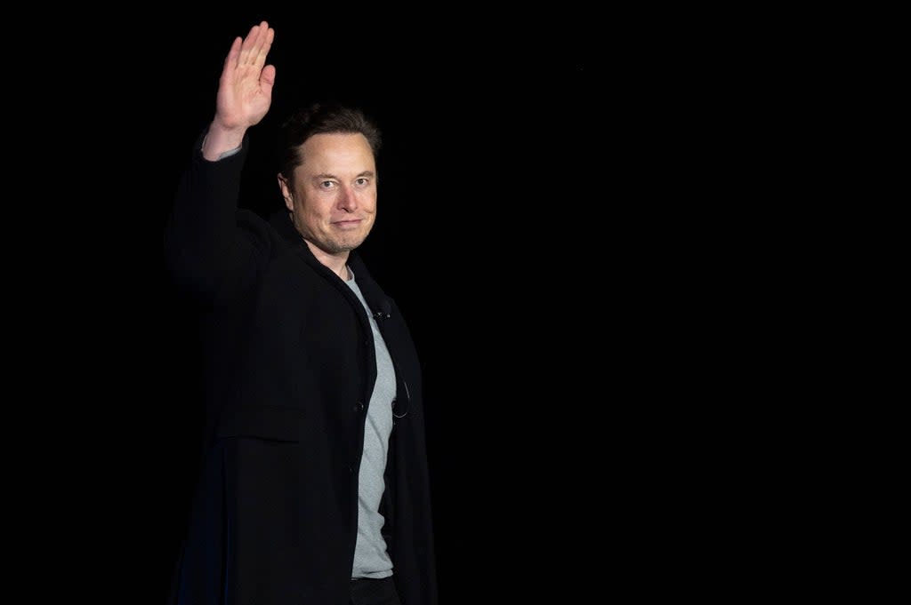 Elon Musk gestures as he speaks during a press conference at SpaceX's Starbase facility near Boca Chica Village in South Texas on February 10, 2022 (AFP via Getty Images)