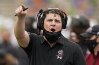 South Carolina head coach Will Muschamp has words with an official during the first half of an NCAA college football game against Florida, Saturday, Oct. 3, 2020, in Gainesville, Fla. (AP Photo/John Raoux, Pool)