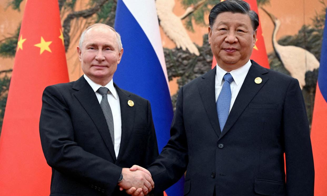 <span>Vladimir Putin and Xi Jinping, the presidents of Russia and China, in October. They will meet in Beijing this week to discuss trade.</span><span>Photograph: Sputnik/Reuters</span>