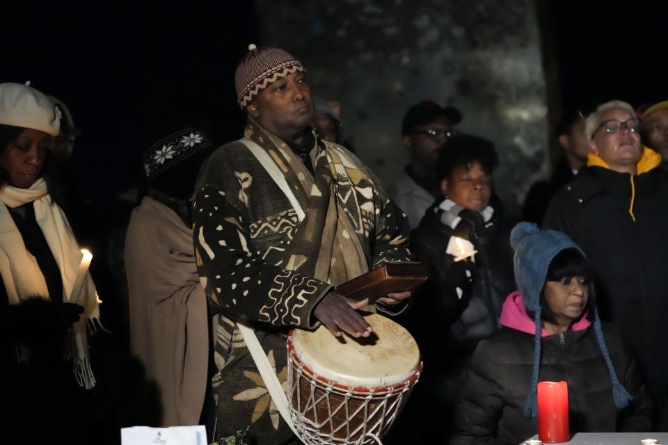 A man plays a drum at a candlelight vigil for Tyre Nichols, who died after being beaten by Memphis police officers, in Memphis, Tenn., Thursday, Jan. 26, 2023. (AP Photo/Gerald Herbert)