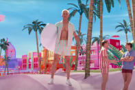 <p>The only thing more eye-searing than Gosling's tan is his pastel beach outfit! </p>