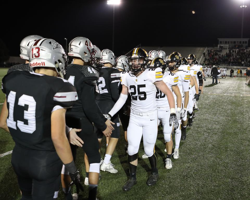 Southeast Polk Rams Zach Strickland (25) shakes hands after the game with the Ankeny Centennial Jaguars at Ankeny football stadium.