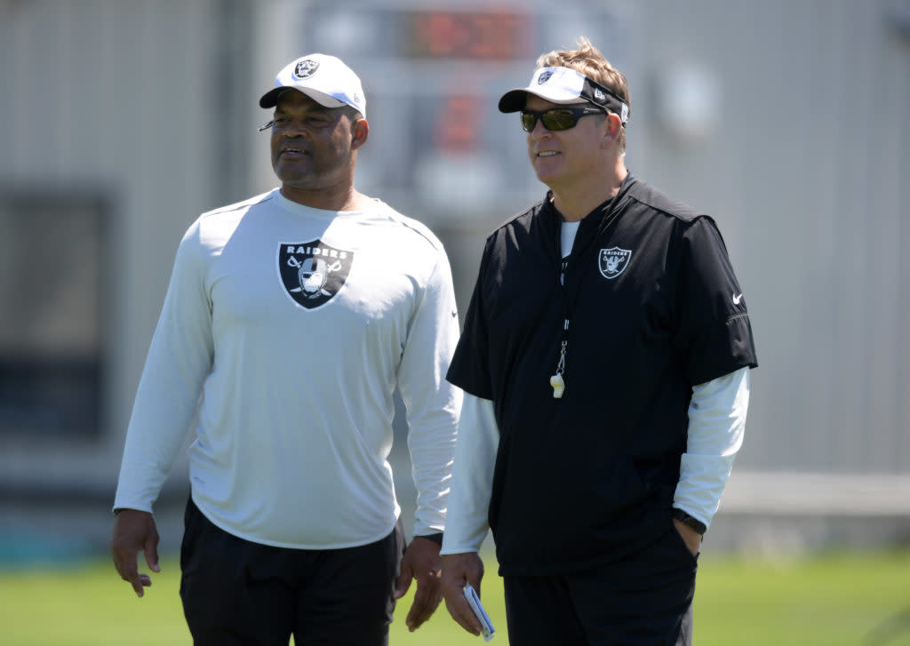 Oakland Raiders defensive coordinator Ken Norton Jr. (left) and coach Jack Del Rio