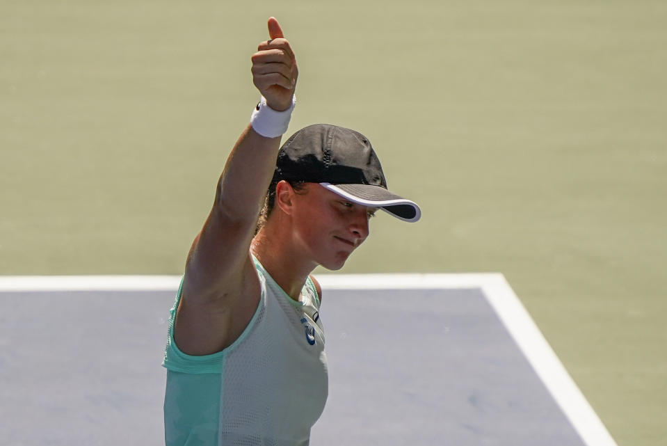 Iga Swiatek, of Poland, reacts after defeating Jasmine Paolini, of Italy, during the first round of the US Open tennis championships, Tuesday, Aug. 30, 2022, in New York. (AP Photo/John Minchillo)