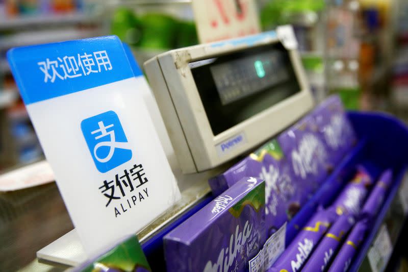 FILE PHOTO: An Alipay logo is seen at a cashier in Shanghai January 12, 2017. REUTERS/Ali Song