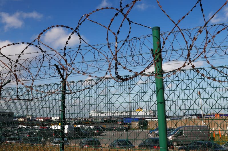 A barbed wire is seen on a fence at the port of Zeebrugge