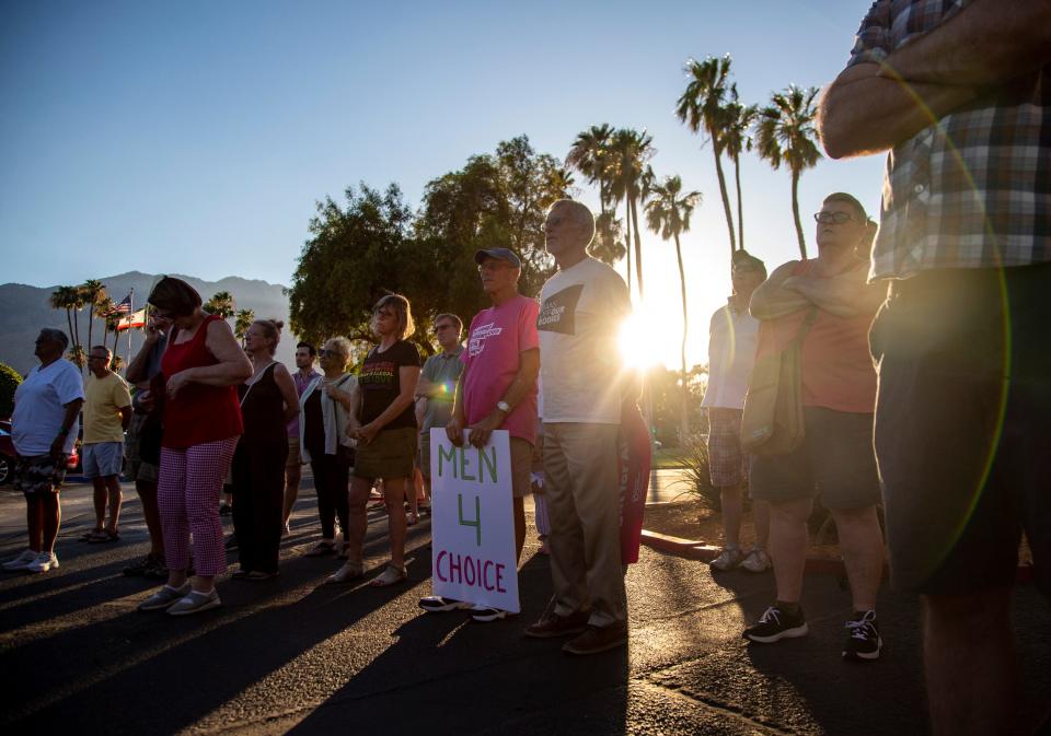 Abortion rights supporters listen to speakers share their stories during a rally organized by Courageous Resistance of the Desert in front of the Palm Springs Courthouse in Palm Springs, Calif., Friday, June 24, 2022. 