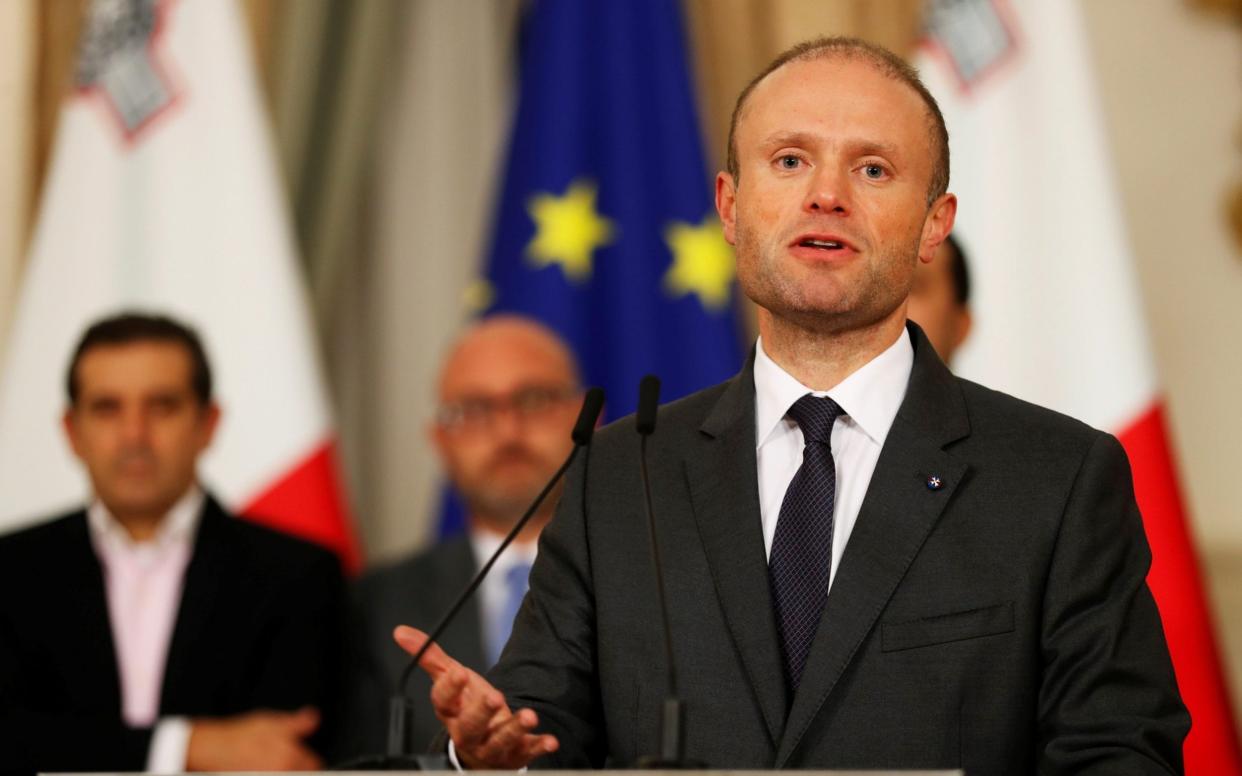 Maltese Prime Minister Joseph Muscat addresses a press conference after an urgent Cabinet meeting at the Auberge de Castille in Valletta - REUTERS