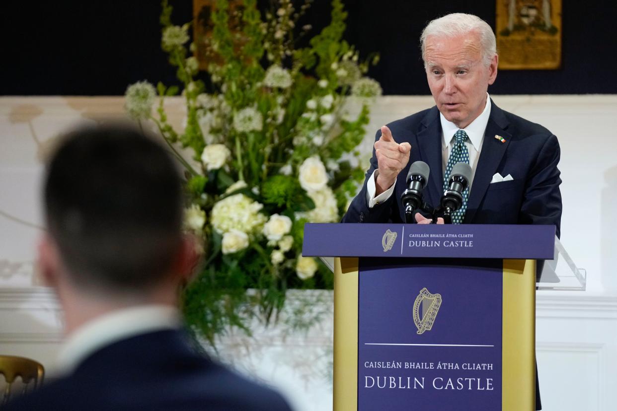 President Joe Biden speaks during a banquet dinner at Dublin Castle (AP)