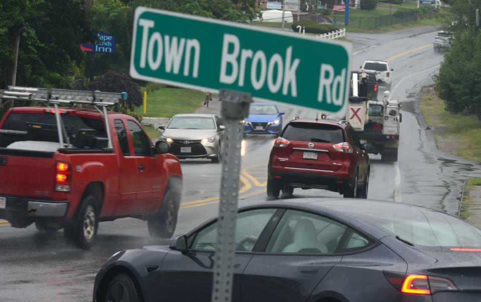 Drivers work their way from Town Brook Road onto Route 28 in West Yarmouth.