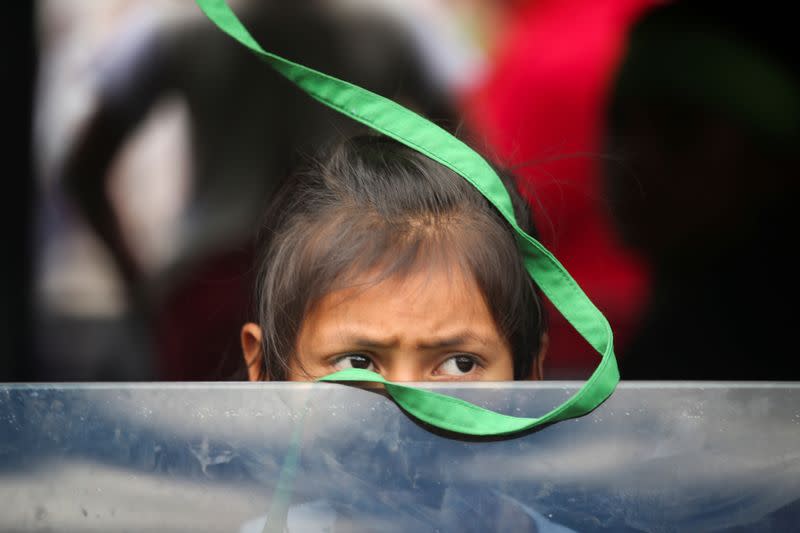 Demonstrators take part in a protest as a national strike continues in Bogota