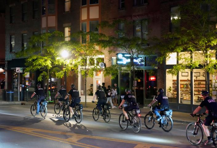 May 19, 2023; Columbus, Ohio, USA; In the wake of the gun violence Columbus police had an increased presence in cruisers, on bicycles and on foot in the Short North. Columbus Mayor Andrew J. Ginther requested that businesses voluntarily close at midnight for the upcoming weekend.