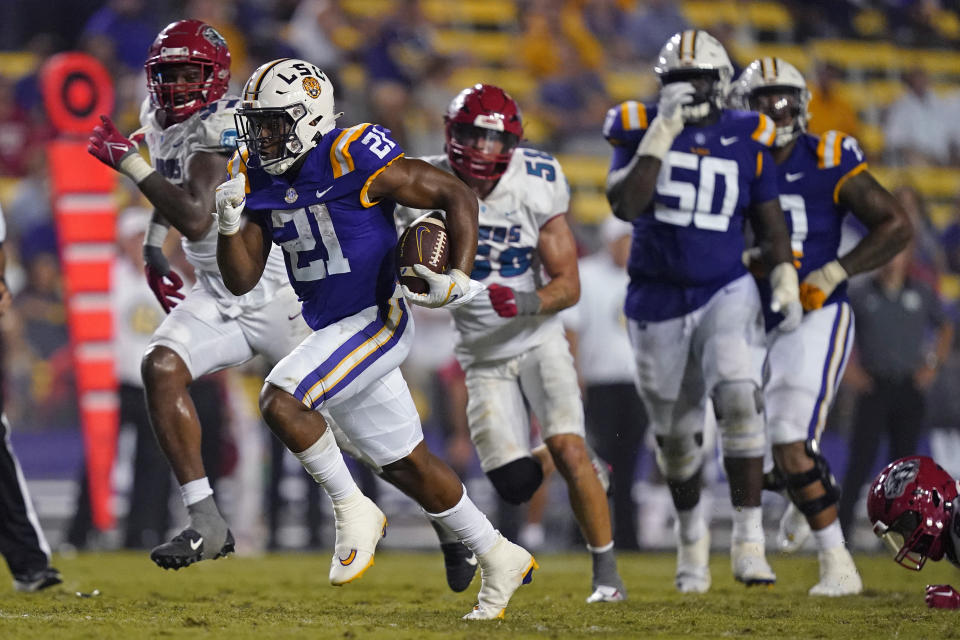 LSU running back Noah Cain (21) carries for a touchdown in the second half of an NCAA college football game against New Mexico in Baton Rouge, La., Saturday, Sept. 24, 2022. LSU won 38-0. (AP Photo/Gerald Herbert)