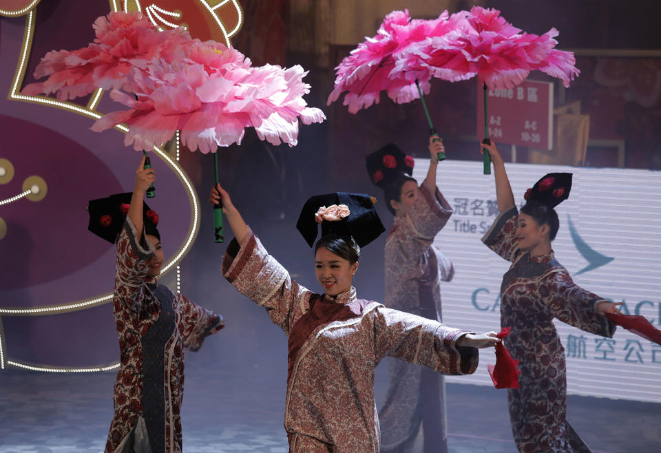 Performers take part in a night parade to celebrate Chinese New Year in Hong Kong, Saturday, Jan. 28, 2017. The Lunar New Year this year marks the Year of the Rooster in the Chinese calendar. (AP Photo/Vincent Yu)