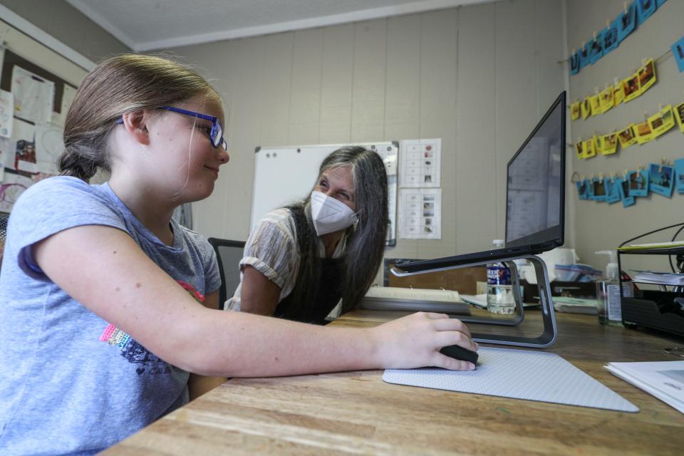 Speech language pathologist works with a student in her Crestwood office. "They come to me extremely crushed, like they can't learn," she said.