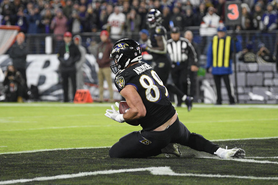 Baltimore Ravens tight end Mark Andrews catches a touchdown pass from quarterback Lamar Jackson against the Cleveland Browns during the second half of an NFL football game, Sunday, Nov. 28, 2021, in Baltimore. (AP Photo/Nick Wass)