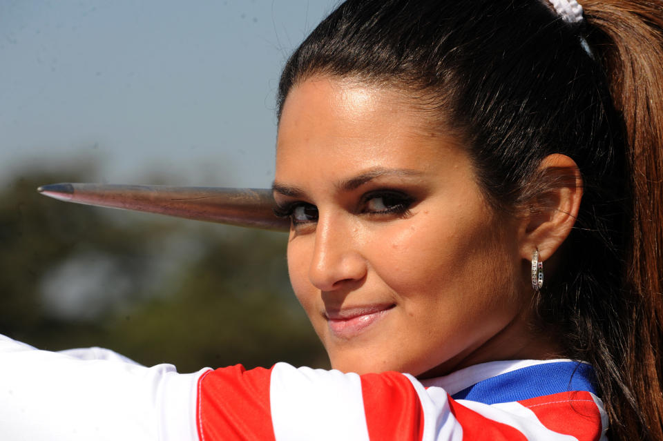 Leryn Franco, member of the Paraguayan Olympic javelin team and model, takes part in a practice ahead of the London 2012 Olympic Games, in Asuncion on July 19, 2012. Franco's beauty was a media sensation during the Beijing 2008 Olympic Games. (Norberto Duarte/AFP/Getty Images)