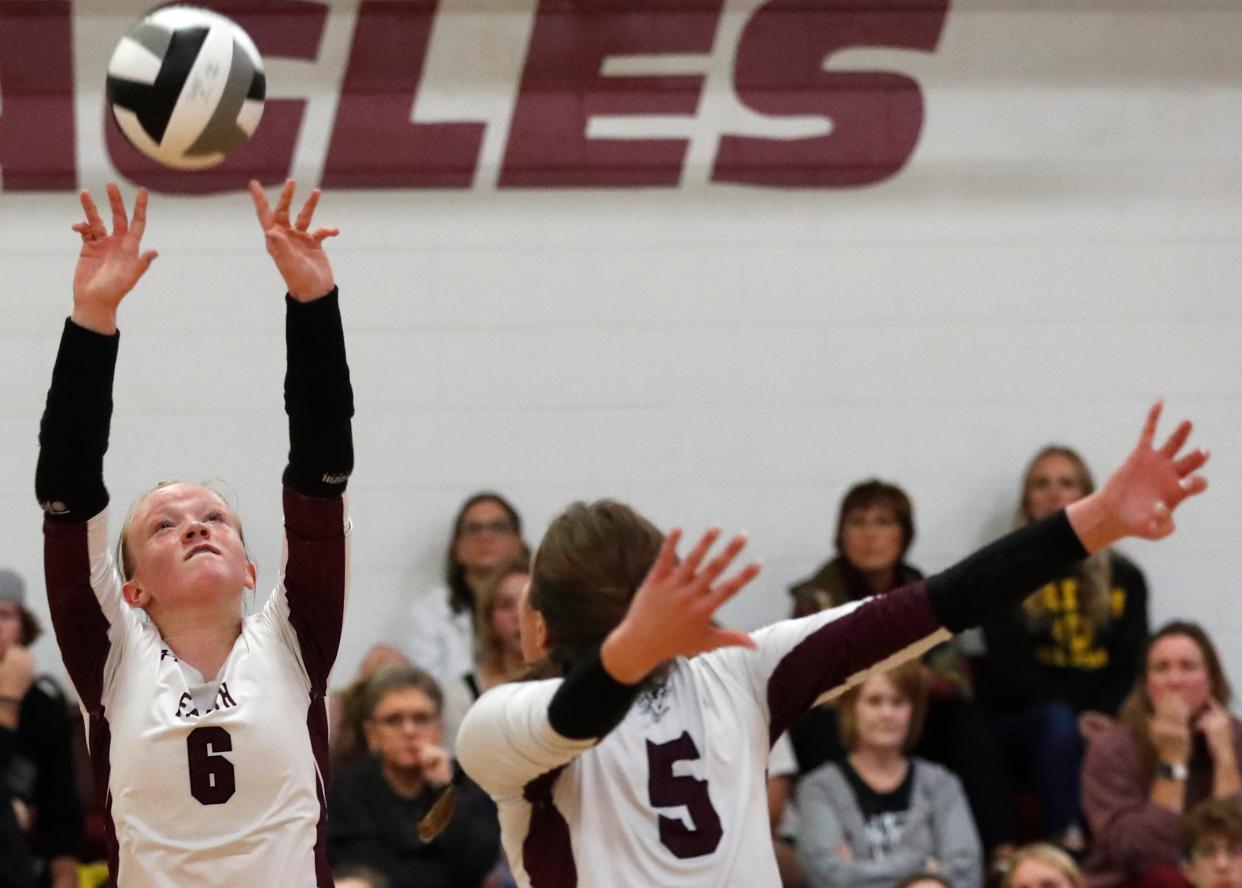 Faith Christian Eagles Olivia Barber (6) sets the ball for Faith Christian Eagles middle blocker Anna Riley (5) during the IHSAA girls volleyball match against the Benton Central Bison, Thursday, Oct. 5, 2023, at Faith Christian High School in Lafayette, Ind. Benton Central Bison won 3-0.