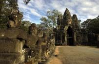 The South gate of Angkor Thom features a giant face. The temple appears in the Angelina Jolie-starring Hollywood movie Tomb Raider.