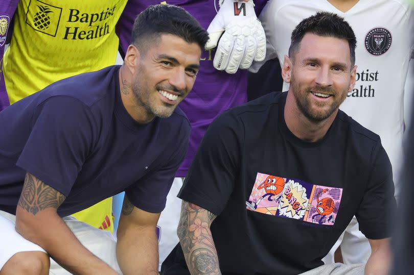 FORT LAUDERDALE, FLORIDA - MAY 24: Luis Suárez and Lionel Messi look on during the Youth International Cup Opening Ceremony match at Chase Stadium on May 24, 2024 in Fort Lauderdale, Florida.