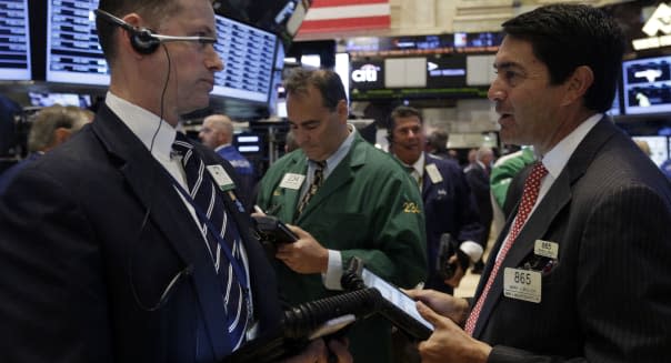 new york stock exchange traders wall street investing earnings bonds economy
