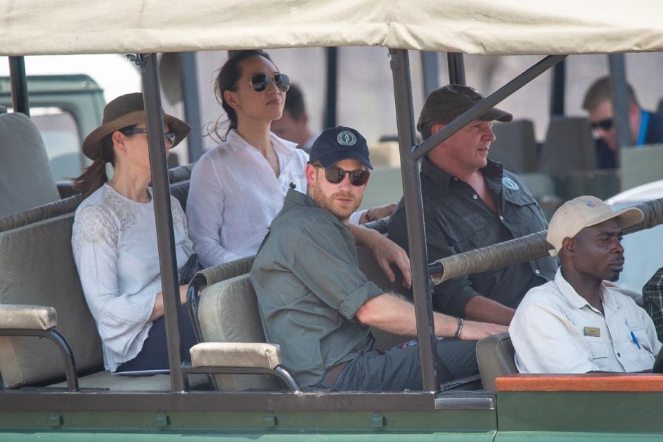 Prince Harry, Duke of Sussex (front centre) arrives by safari jeep to watch an anti-poaching demonstration exercise (Getty Images)