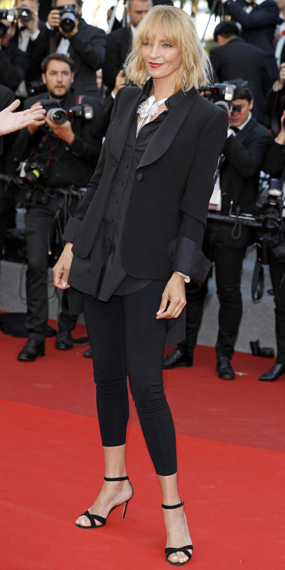 <p>No one does a suit quite like Uma. We love her in this slim black number, which she wore to the <em>Based on a True Story</em> premiere. </p>