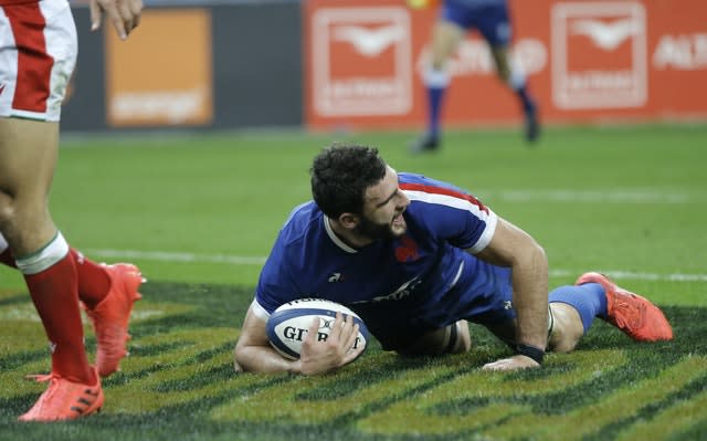 France captain Charles Ollivon celebrates after scoring a try