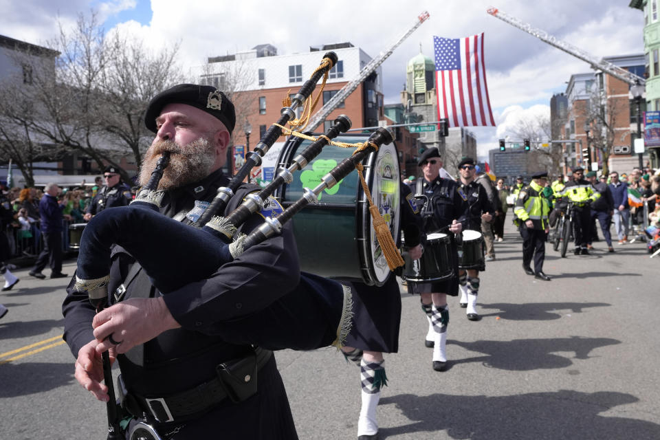 Members of the Boston Police Gaelic Column of Pipes and Drums march in the St. Patrick's Day parade, Sunday, March 17, 2024, in Boston's South Boston neighborhood. (AP Photo/Steven Senne)