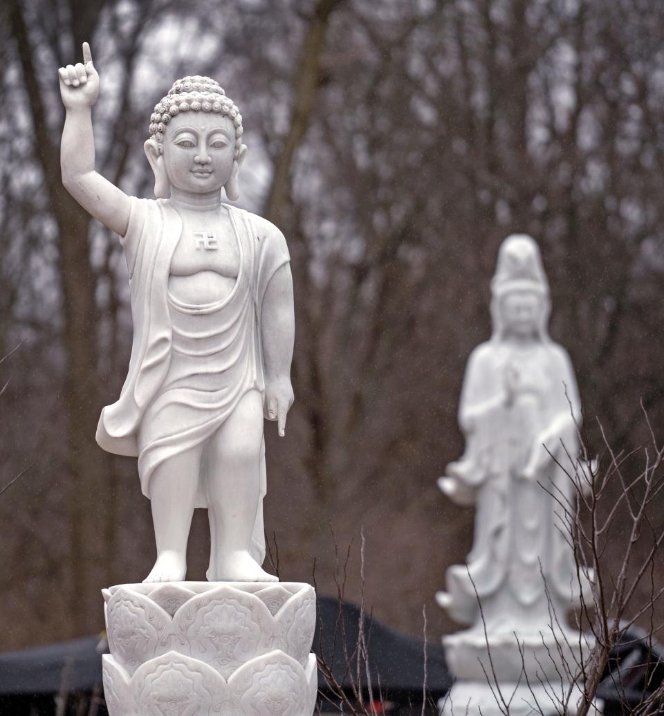 Buddhas are part of the sculpture garden Thursday, Feb. 9, 2023 at Phap An Temple.
